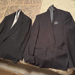 Two Men’s Black Suits 