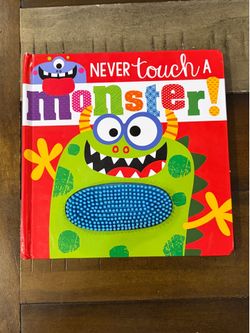 Never Touch A Monster. Touch and Feel Book