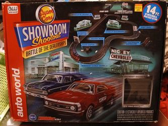 2 x electric racing slot car showroom shpotout