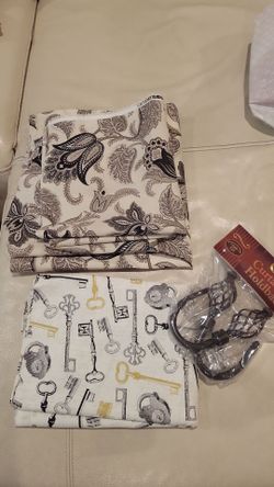 Material for upholstery , or a curtain , and one set of curtain stems for a rod