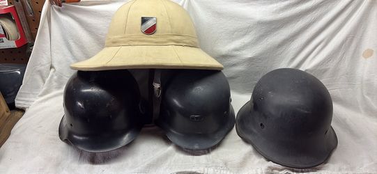 Four German helmets for sale