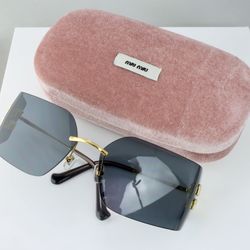 Miu Miu Oversized Runway Sunglasses in Gray