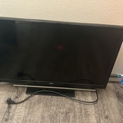 Tv  With Roku Box And Remote 