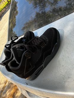 Black Cat Jordan 4s