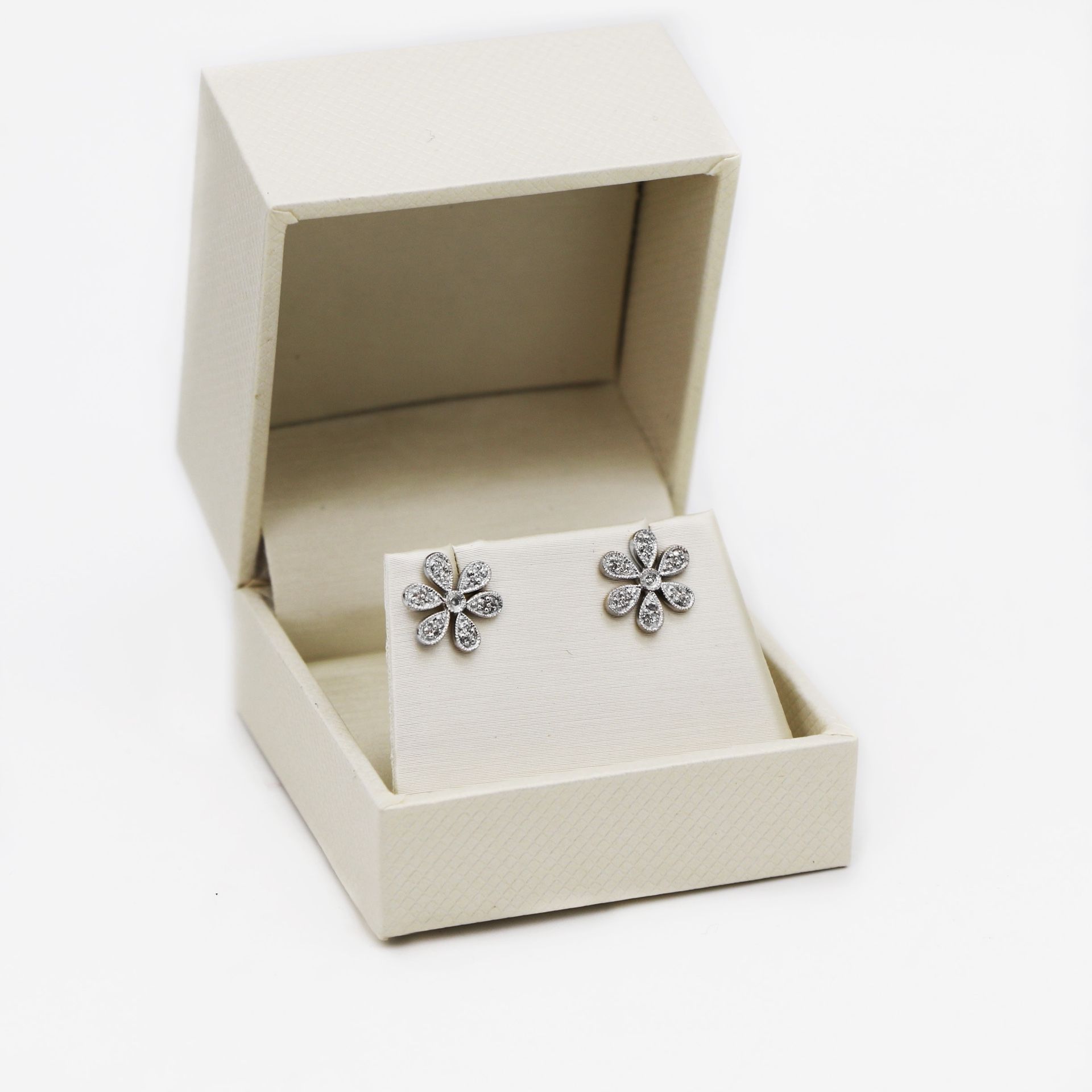 14K Gold Flower Diamond .16twc Stud earrings. Only $400