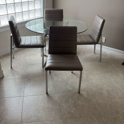 Dining Set With 46 Inch Glass Round Top And 4 Chairs
