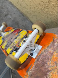 Flip skateboard with venture trucks