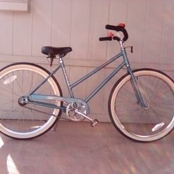 Woman, 26" Vintage Schwinn Cruiser.