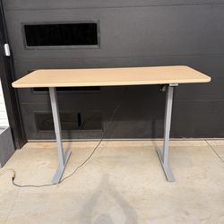 72 x 30 inches adjustable office table. New condition, but small dent on the corner.