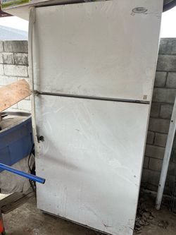 Whirlpool Top-Freezer Refrigerator White  & White GE Stove