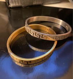2 stainless steel bracelets