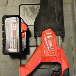 Milwaukee Sawzall With Battery And Lots Of Blades