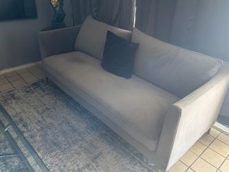 Gray velvet sofa