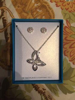 Brand new in box butterfly necklace with earrings.