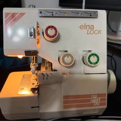 Sewing machine- elna lock f3