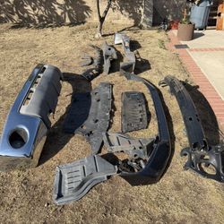 Front and rear bumper assemblies from a 2007 Toyota Tundra .