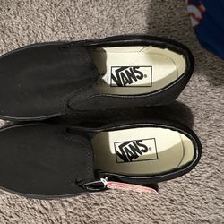 Black slip on vans