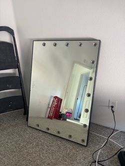 IMPRESSIONS VANITY MIRROR