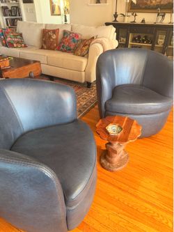 2 swivel barrel chairs dark blue