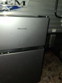 Mini fridge has freezer