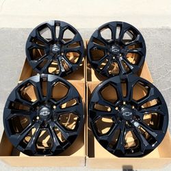 20” Chevrolet Silverado Chevy original factory rims in new gloss black