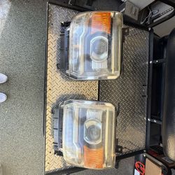 2016 GMC 2500 Denali headlights Used