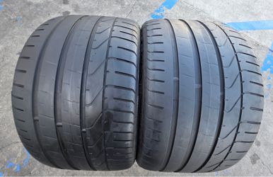 2 USED TIRES PIRELLI 305/30/20