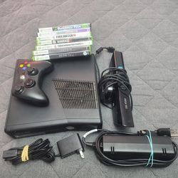 Microsoft Xbox 360 slim with 8 games and kinect in excellent condition
