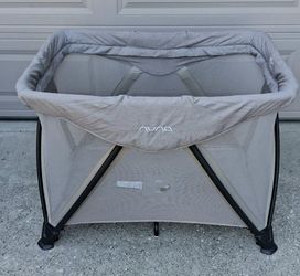 Nuna playard/ travel crib and changer