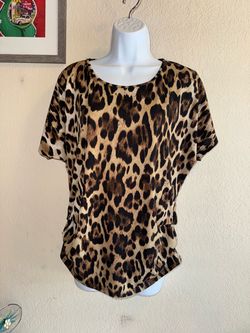 Animal print blouse size M