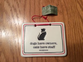 Plaque-Dogs have owners, cats have staff
