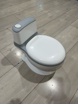 Potty training toilet.   10$