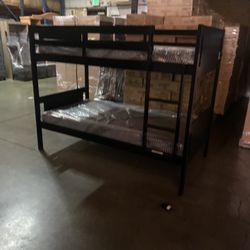 Twin over twin bunk bed. White or espresso. Assembly required. Assembly not included. Taxes included. Free delivery.  Bunk Bed only without Assembly-$