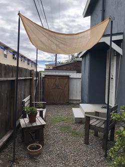 4 Metal Posts and Sail Shade