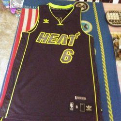 Limited edition size small N.B.A. Adidas jersey.
