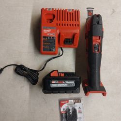 MILWAUKEE MULTI TOOL 18V LITHIUM WITH BATTERY AND CHARGER EXTRA BLADES 