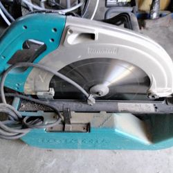 MAKITA 16 1/4 " BEAM SAW.     USED ONCE