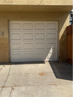8x7 used Garage door