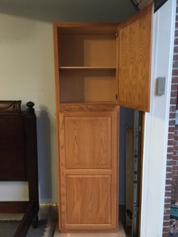 Used 5 shelf wood pantry cabinet with 3 adjustable shelves for