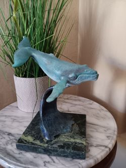 $65 Bronze Marble Whale Sculpture. It is Approximately 
10" Tall and 9" Wide