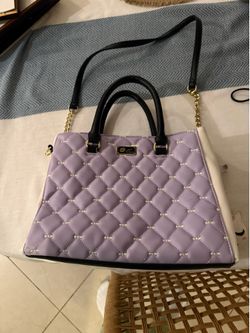 Betsy Johnson Lavendar purse with a pair of Vibtage Paul Frank sunglasses and Ralph Lauren sunglasses