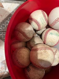Bucket of Leather and Synthetic Baseballs