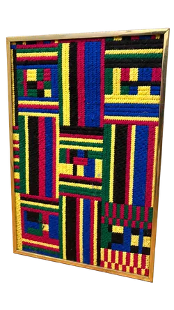 Framed geometric patchwork artwork