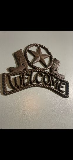 Cast iron welcome sign