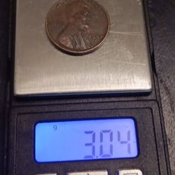 1944 Lincoln Wheat Penny, L on the rim. Haven't been clean