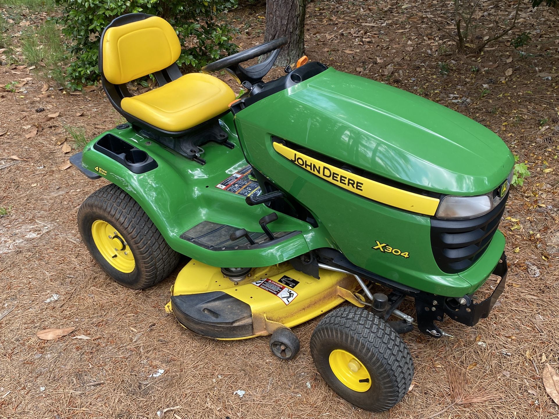 John Deere x304 Riding Mower Lawn Tractor with Kawasaki Engine and 4-Wheel Steering