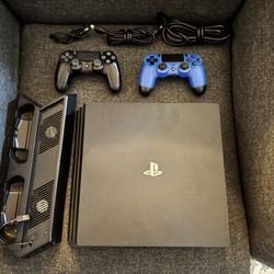 PlayStation 4 Pro W/ Accessories