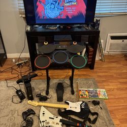 Guitar Hero Rock band set w/ 2 guitars, drums, Xbox 360 console, mic, 3 games, Tested Restored