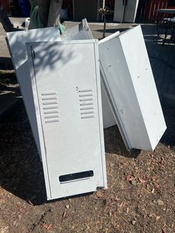 Metal boxes for exterior tankless water heaters