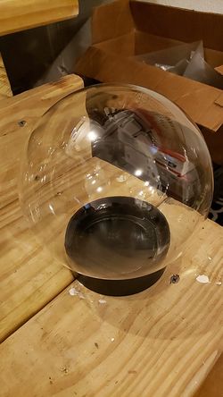 Round glass globe with plastic base